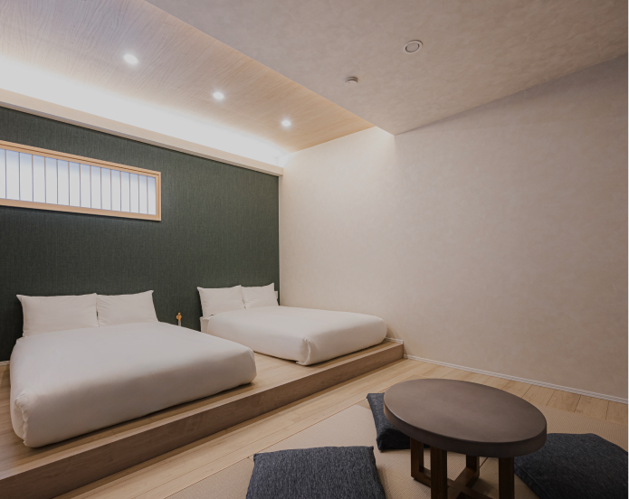 清潔感のあるツインベッドの寝室